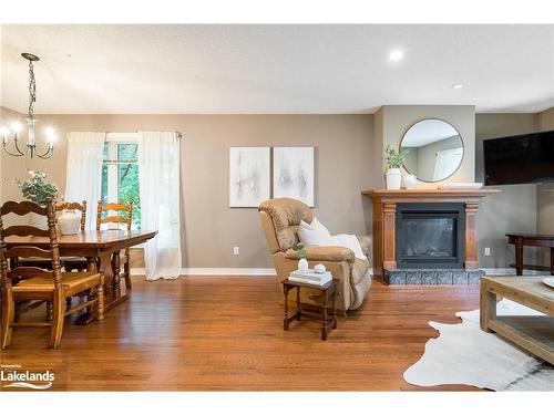 84 Wasaga Sands Drive, Wasaga Beach, ON - Indoor Photo Showing Living Room With Fireplace