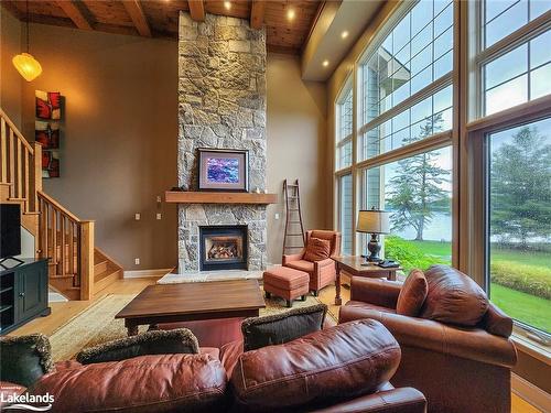 Sandfield 2 Week 10-3876 Muskoka Road 118, Port Carling, ON - Indoor Photo Showing Living Room With Fireplace