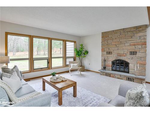 91 Clarke Crescent, Port Sydney, ON - Indoor Photo Showing Living Room With Fireplace