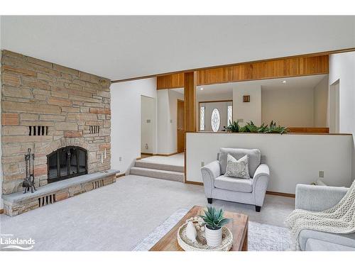 91 Clarke Crescent, Port Sydney, ON - Indoor Photo Showing Living Room With Fireplace