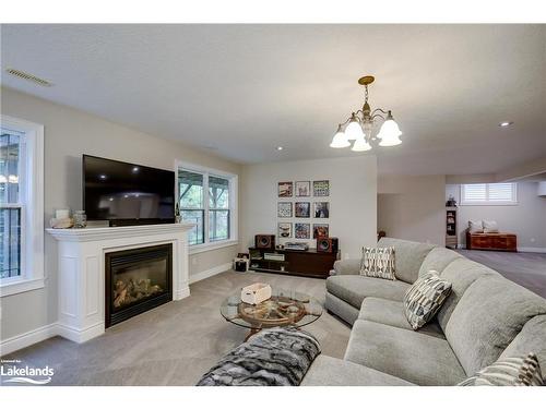 17 Gainsborough Road, Bracebridge, ON - Indoor Photo Showing Living Room With Fireplace