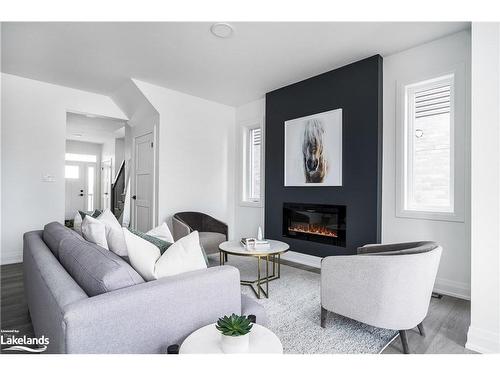 253 Jackson Street E, Durham, ON - Indoor Photo Showing Living Room With Fireplace