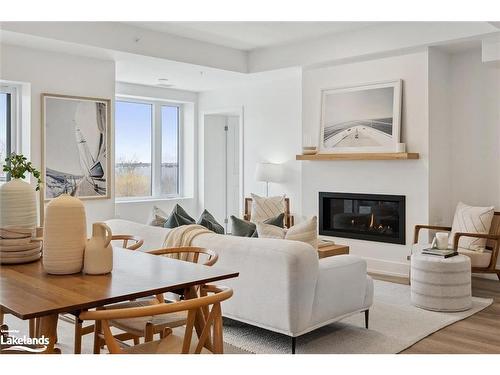 201-19B West Street N, Fenelon Falls, ON - Indoor Photo Showing Living Room With Fireplace