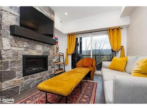 202-18 Beckwith Lane, The Blue Mountains, ON - Indoor Photo Showing Living Room With Fireplace