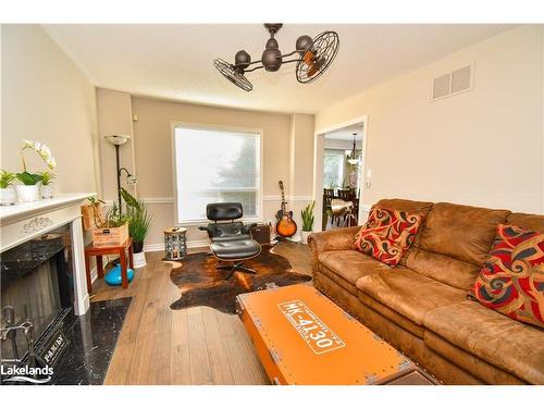 5 Mccutcheon Court, Barrie, ON - Indoor Photo Showing Living Room With Fireplace