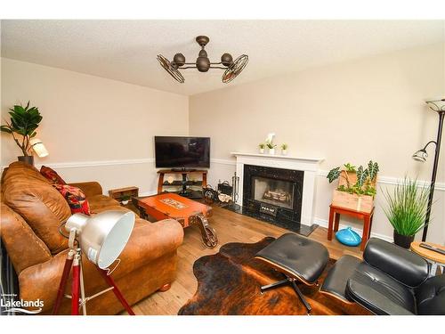 5 Mccutcheon Court, Barrie, ON - Indoor Photo Showing Living Room With Fireplace