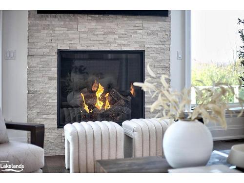 122 Maryward Crescent, The Blue Mountains, ON - Indoor Photo Showing Living Room With Fireplace