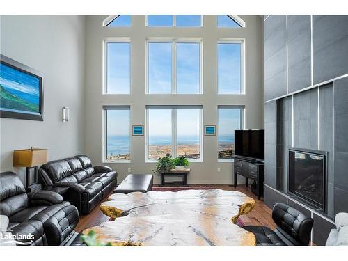 107 Maple Lane, The Blue Mountains, ON - Indoor Photo Showing Living Room With Fireplace