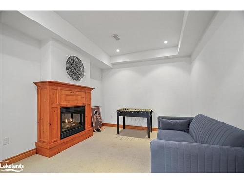 32-214 Blueski George Crescent, The Blue Mountains, ON - Indoor Photo Showing Living Room With Fireplace