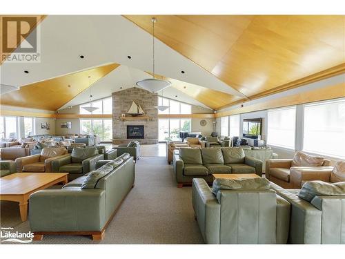 402 Mariners Way, Collingwood, ON - Indoor Photo Showing Living Room With Fireplace