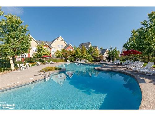 226-125 Fairway Court, The Blue Mountains, ON - Outdoor With In Ground Pool With Backyard