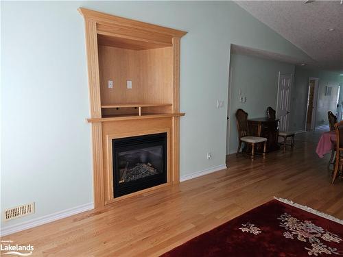 144 Meadow Lane, Wasaga Beach, ON - Indoor Photo Showing Living Room With Fireplace