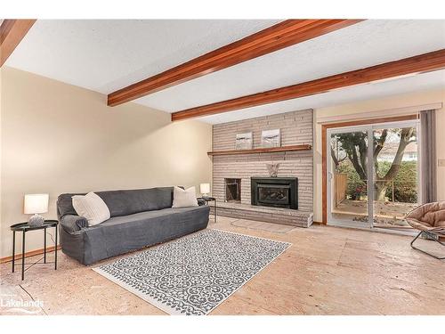 54 Townley St Street, Nottawa, ON - Indoor Photo Showing Living Room With Fireplace