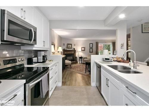 9-127 Alfred Street, Thornbury, ON - Indoor Photo Showing Kitchen With Stainless Steel Kitchen With Double Sink