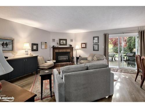 9-127 Alfred Street, Thornbury, ON - Indoor Photo Showing Living Room With Fireplace