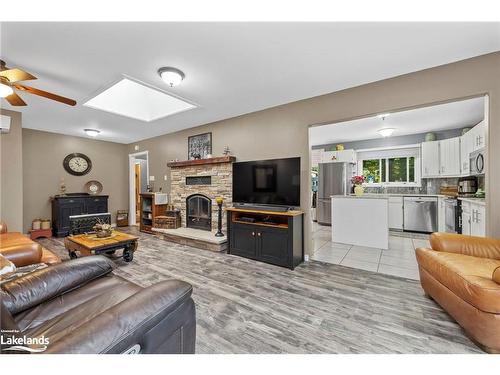 99 Bayview Drive, Carling, ON - Indoor Photo Showing Living Room With Fireplace