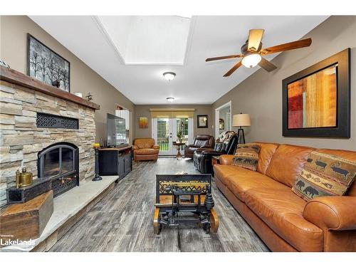 99 Bayview Drive, Carling, ON - Indoor Photo Showing Living Room With Fireplace