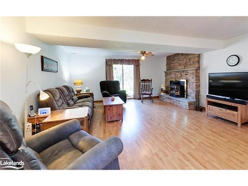 221 John Street, Stayner, ON - Indoor Photo Showing Living Room With Fireplace