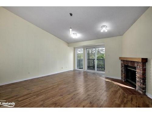 34-5 Harbour Street East, Collingwood, ON - Indoor Photo Showing Other Room With Fireplace