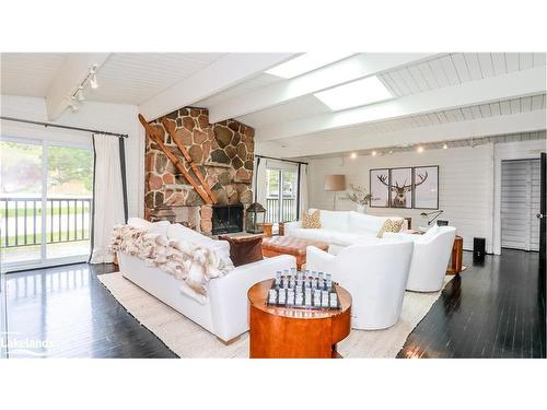 102 Wyandot Court, The Blue Mountains, ON - Indoor Photo Showing Living Room With Fireplace