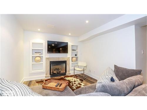 102 Wyandot Court, The Blue Mountains, ON - Indoor Photo Showing Living Room With Fireplace