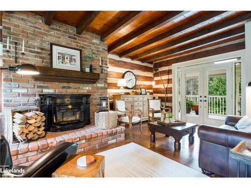 587318 10Th Sideroad, Mulmur, ON - Indoor Photo Showing Living Room With Fireplace