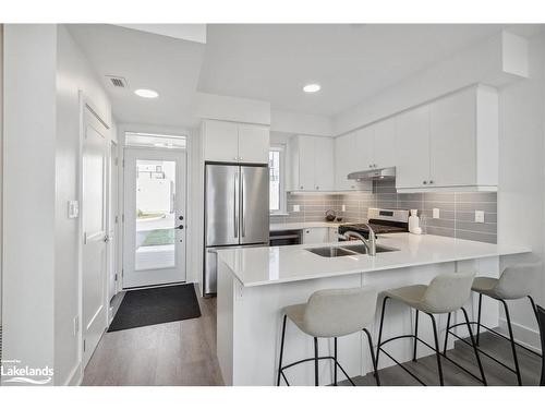 9-19B West Street, Kawartha Lakes, ON - Indoor Photo Showing Kitchen With Stainless Steel Kitchen With Double Sink With Upgraded Kitchen