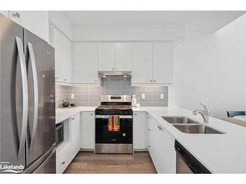 9-19B West Street, Kawartha Lakes, ON - Indoor Photo Showing Kitchen With Stainless Steel Kitchen With Double Sink With Upgraded Kitchen