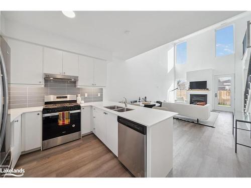 9-19B West Street, Kawartha Lakes, ON - Indoor Photo Showing Kitchen With Stainless Steel Kitchen With Double Sink