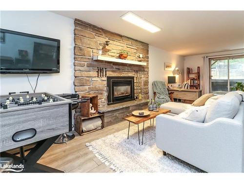 109 Knox Road W, Wasaga Beach, ON - Indoor Photo Showing Living Room With Fireplace