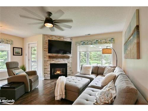 333 Mariners Way, Collingwood, ON - Indoor Photo Showing Living Room With Fireplace