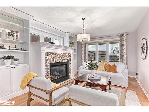 12 Smart Court, Collingwood, ON - Indoor Photo Showing Living Room With Fireplace