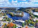 101-32 Brunel Road, Huntsville, ON  - Outdoor With Body Of Water With View 