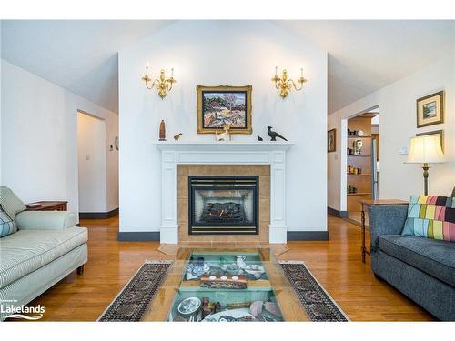 9450 County Road 9, Clearview, ON - Indoor Photo Showing Living Room With Fireplace