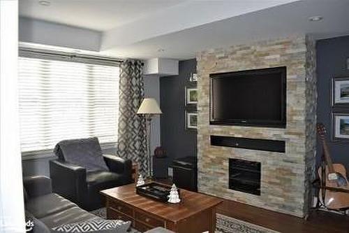 15 Wally Drive, Wasaga Beach, ON - Indoor Photo Showing Living Room With Fireplace