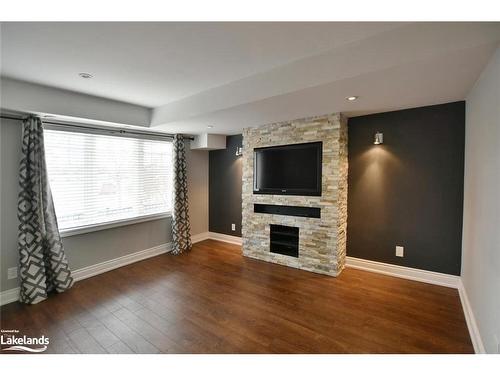 15 Wally Drive, Wasaga Beach, ON - Indoor Photo Showing Living Room With Fireplace