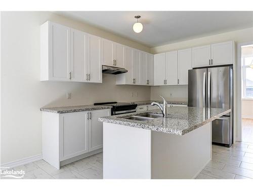 77 Sun Valley Avenue, Wasaga Beach, ON - Indoor Photo Showing Kitchen With Stainless Steel Kitchen With Double Sink With Upgraded Kitchen