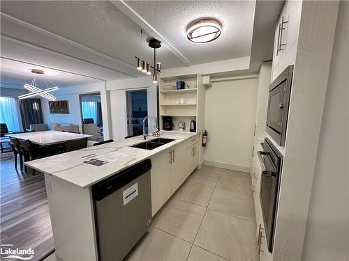 5117-9 Harbour Street E, Collingwood, ON - Indoor Photo Showing Kitchen With Double Sink