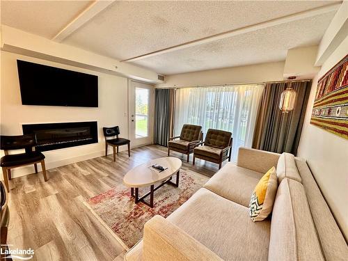 2408-9 Harbour Street E, Collingwood, ON - Indoor Photo Showing Living Room With Fireplace