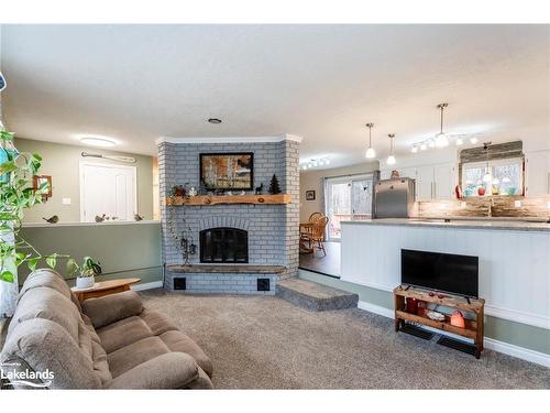 15 Mundy Avenue, Tiny, ON - Indoor Photo Showing Living Room With Fireplace