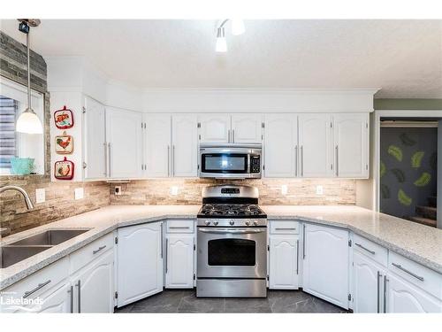 15 Mundy Avenue, Tiny, ON - Indoor Photo Showing Kitchen With Double Sink