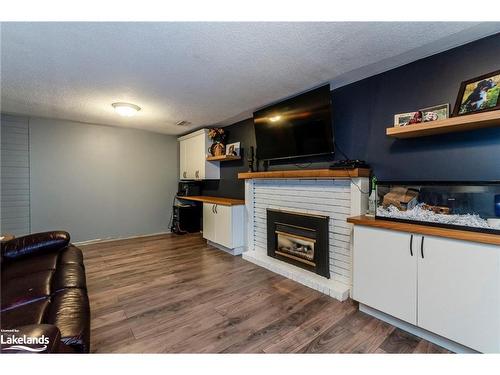 80 Woodland Drive, Midland, ON - Indoor Photo Showing Living Room With Fireplace