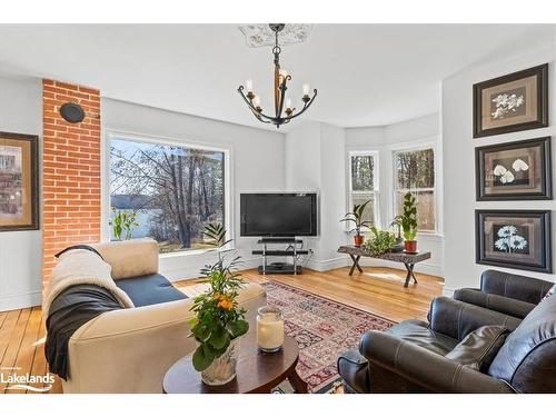 4718 County Rd 21, Haliburton, ON - Indoor Photo Showing Living Room With Fireplace