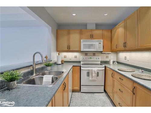 208-110 Steamship Bay Road, Gravenhurst, ON - Indoor Photo Showing Kitchen With Double Sink