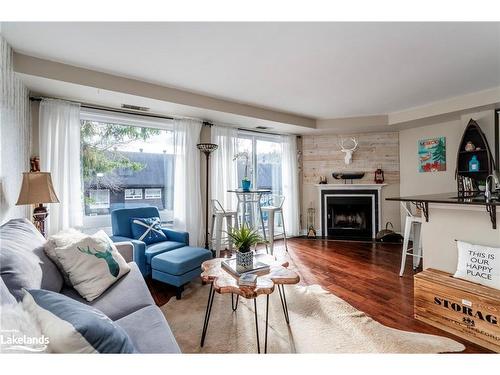 27 Turner Drive, Huntsville, ON - Indoor Photo Showing Living Room With Fireplace