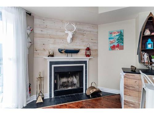 27 Turner Drive, Huntsville, ON - Indoor Photo Showing Living Room With Fireplace