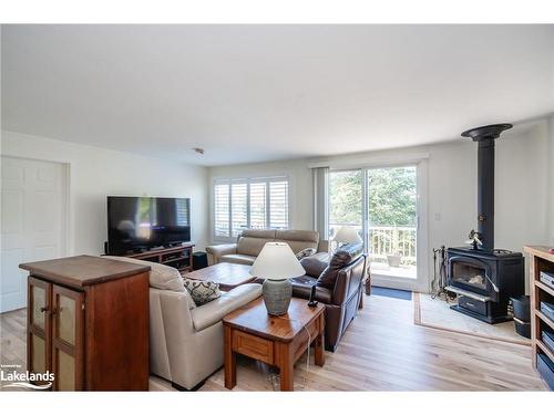 1020 Frau Lane, Bracebridge, ON - Indoor Photo Showing Living Room With Fireplace