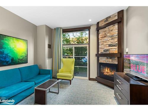 106-190 Jozo Weider Boulevard, The Blue Mountains, ON - Indoor Photo Showing Living Room With Fireplace