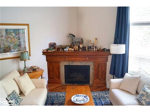 111 Ellen Lane, Collingwood, ON - Indoor Photo Showing Living Room With Fireplace