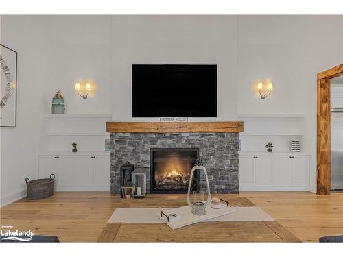 395 Eastdale Drive, Wasaga Beach, ON - Indoor Photo Showing Living Room With Fireplace